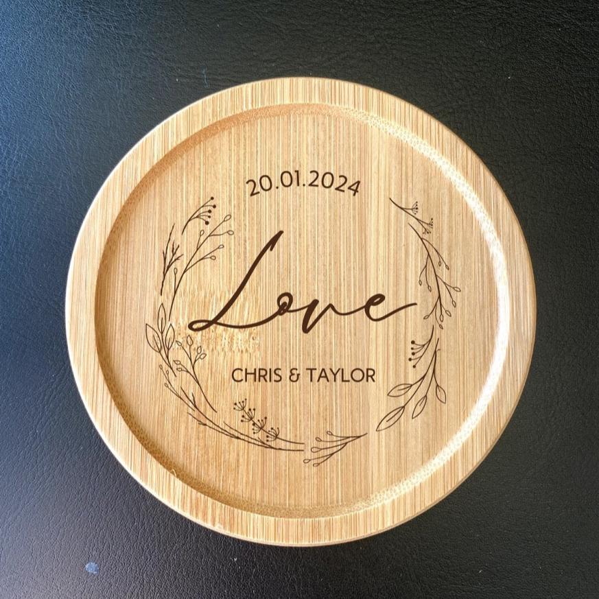 Custom couple initials engraved on floral coasters for wedding and anniversary gifts