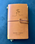 Handmade refillable leather notebook with engraved names and date