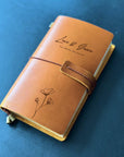 Personalized leather-bound journal with floral engraving, perfect for writers, business professionals, and couples. An ideal custom gift for mum, wife,her