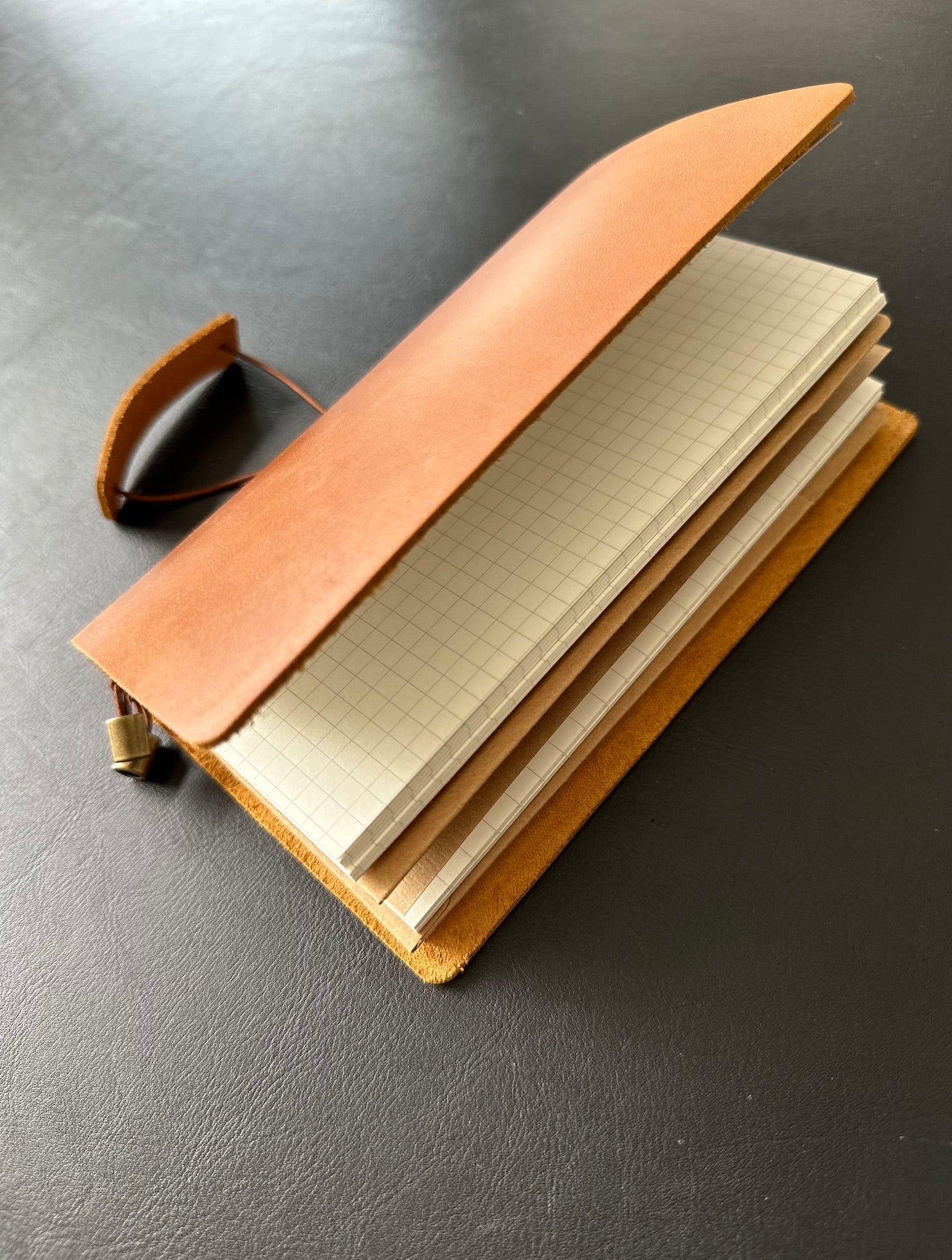 Handcrafted leather journal with personalized engraving
