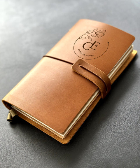 Leather anniversary journal with names engraved on cover