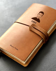 Handmade refillable leather music notes journal with engraved portrait design
