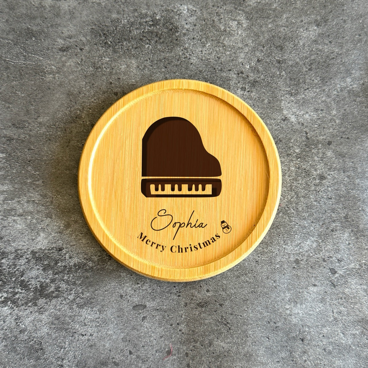 Personalised bamboo coaster featuring piano engraving