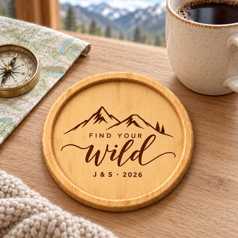 Wooden coaster engraved with the Find Your Wild mountain design