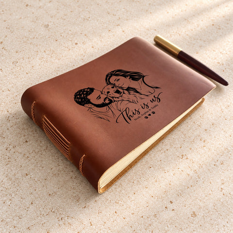 Close-up of a people and pets line portrait on a landscape leather cover.