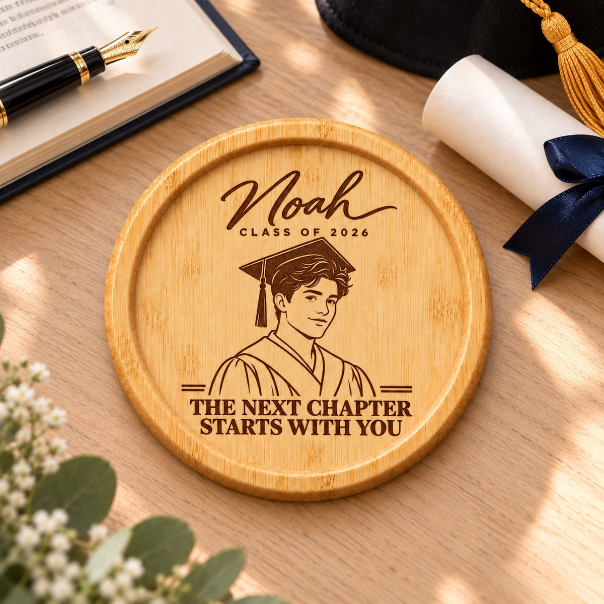 Graduation portrait coaster engraved with a personalised name, class year and The Next Chapter Starts With You message