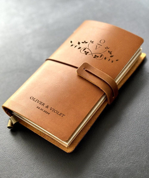 Handmade refillable couple’s leather journal with engraved initials