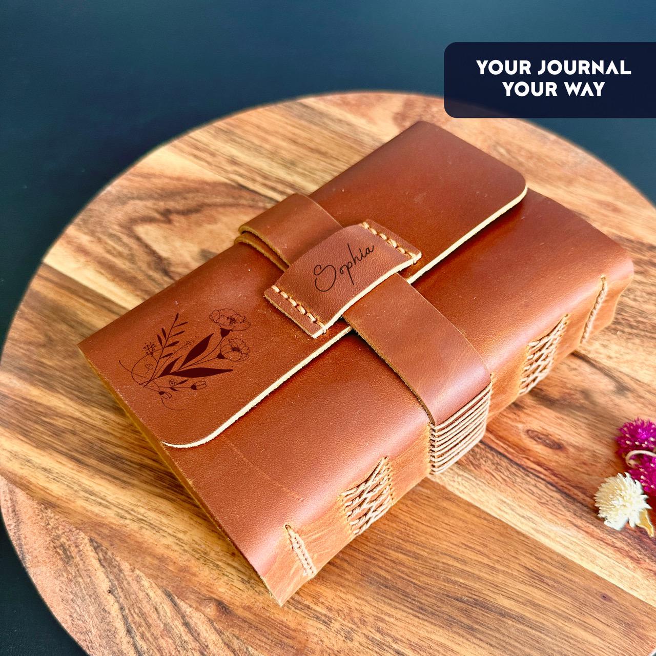 Engraved leather journal with custom name, floral cover and strap closur