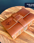 Engraved leather journal with custom name, floral cover and strap closur