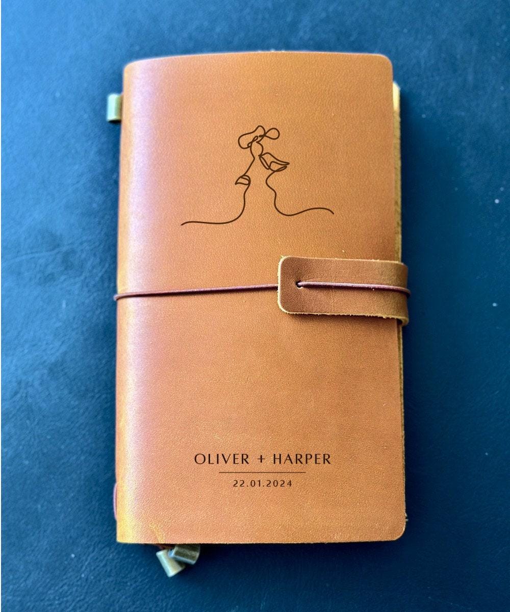 Handmade refillable leather notebook with engraved names and date