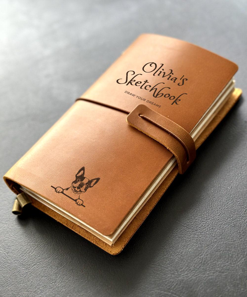 Personalised leather sketchbook with dog illustration and engraved name