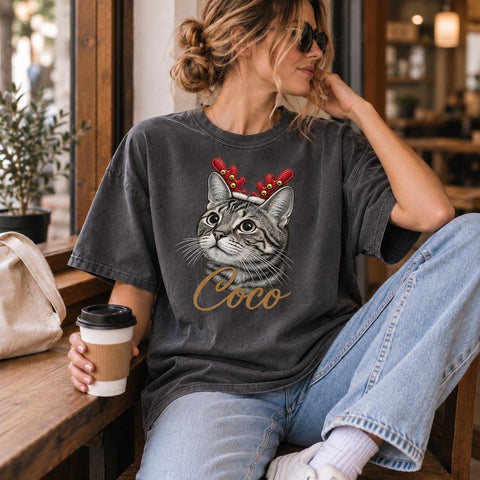 Personalised Christmas T-shirt with a cat portrait, festive antlers and the name Coco.