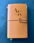 Leather journal with custom design, a unique wedding gift idea